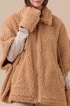 Poncho con guanti eco agnellino